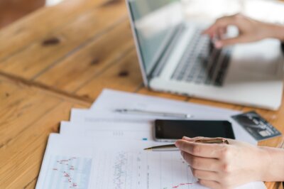 QuickBooks vs ERP - piles of coins